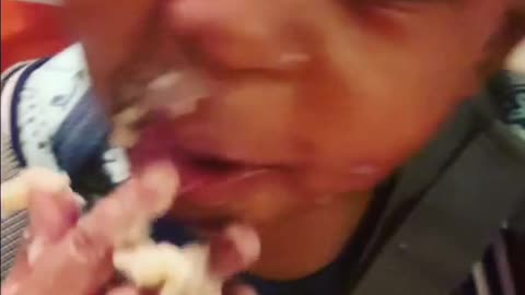baby loves food with funny reaction