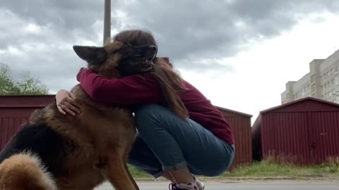 German Shepherd hug