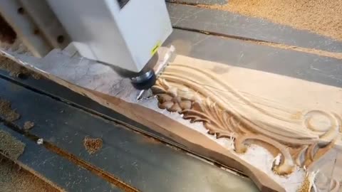 Designing machine for wood craft work
