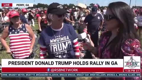 Dorothy at the Trump rally, wearing a QAnon Trump/JFK Jr shirt.