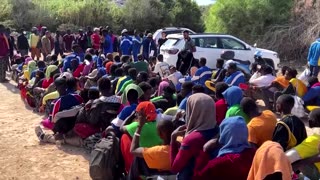 Thousands of migrants overwhelm Italy's Lampedusa
