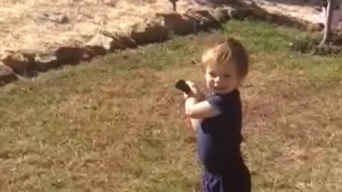 Toddler crushes baseball