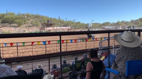 Young living Friesians make a figure 8 at Wickenburg Arizona rodeo