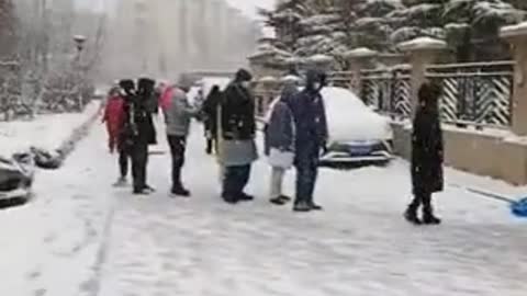 It is getting cold in China and people still have to line up in the snow for their daily PCR test