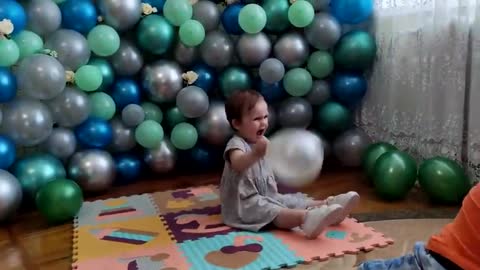 Cute_Baby_Having_fun_Playing_on_Older_Brother's_Birthday