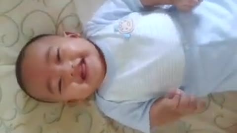 cute 3 month baby laughing out loud