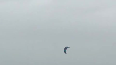 Kitesurfer Catches Huge Air During Storm