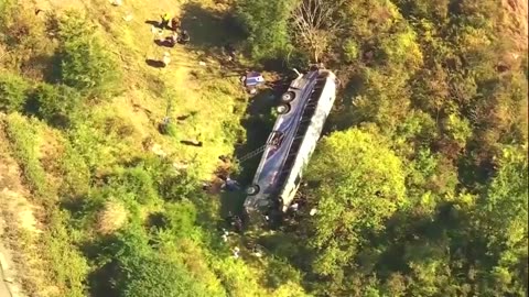 Aerials show overturned bus carrying NY high school band