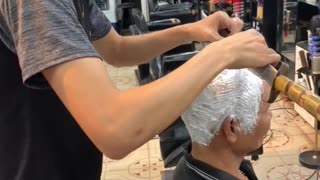 Barber Shaves Customer's Head with Sword