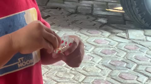 Kid Dips Fries In Closed Sauce Cup