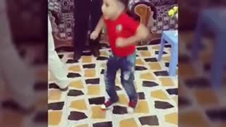 A very kid doing amazing dancing step in marriage ceremony in arab