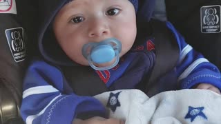 Cute baby in car seat