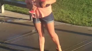 Mom and Daughter At Splashpad