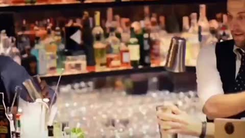 Watch the bartender show off his skills