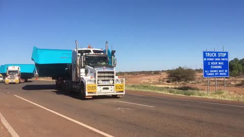 Road Trains departing from Caltex station in Cue, West Austrilia