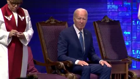Biden looks very awkward at Black Church today.