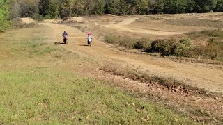 Dad and daughter on the track