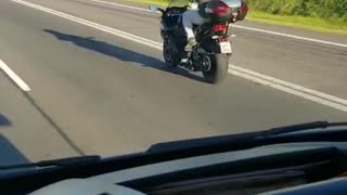 Motorcyclist Uses Ropes for Reins on His Ride