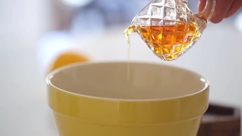 Golden Liquid Poured into Bowl