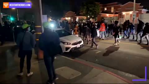 ANTIFA and BLM marching in LA with shields, helmets and sticks