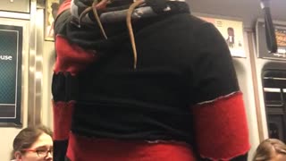 Guy black red jacket rats on back hood
