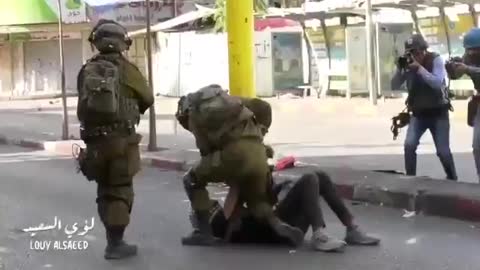 Israeli forces brutally assault and detain a Palestinian