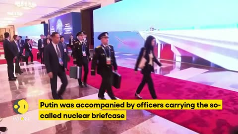 Putin filmed in China accompanied by officers with Russian nuclear briefcase