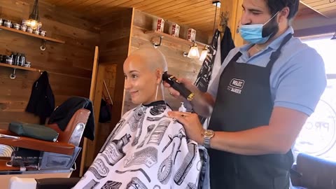 Girl shaves her head bald for charity