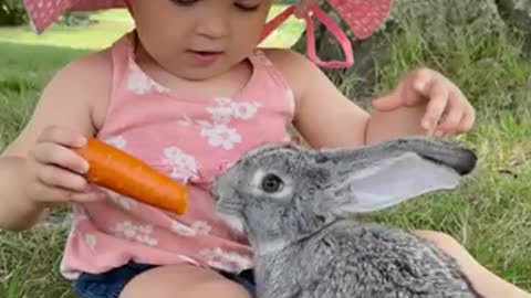 Bridgette shares a carrot with her bunny 💕