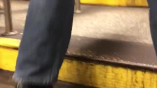 Man rides motorized suitcase out of stairs
