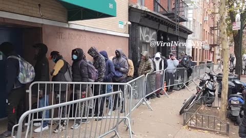 Foreign National Migrants Line Up In Manhattan's East Village To Receive Public Services