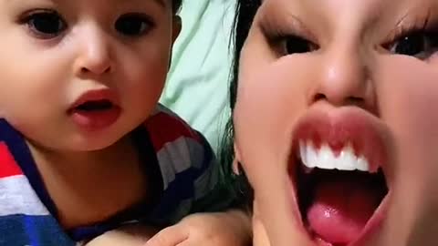 A beautiful child with his mother