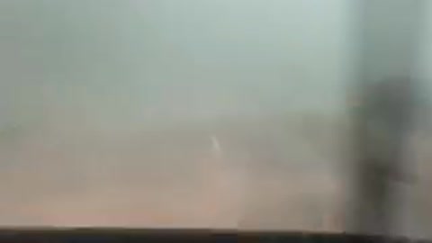 Driving Through a Tornado and Thunderstorm