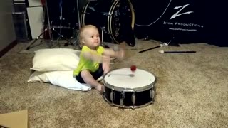 Toddler teaches herself to play the drums