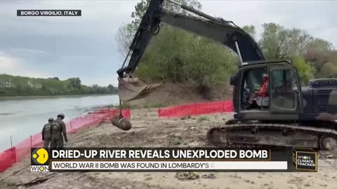 Italy_ Dried-up river reveals 450 kg unexploded bomb, experts carry out controll