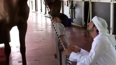 Dubai Prince Fazza Trains a small Kid