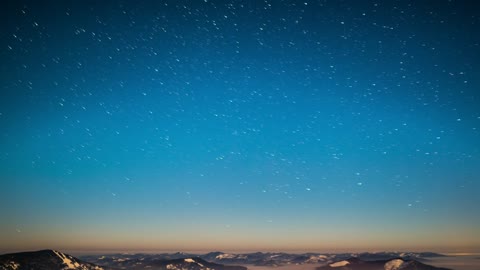 Blue starry sky in the mountains