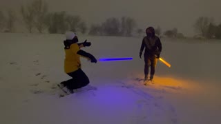 Lightsabers Clash on A Snowy Night