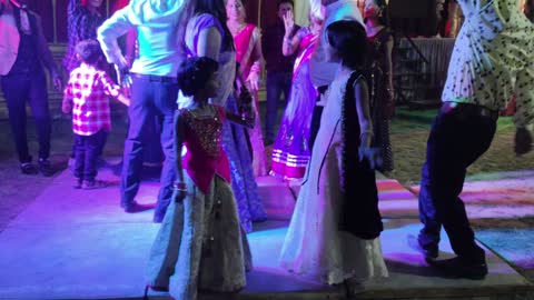 Little cute baby dance in marriage party