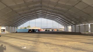 Installation of a large tent, interior view from the inside