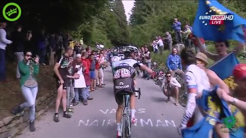 Cyclist owns annoying fan!