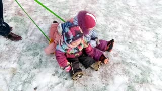 Children's reaction to snow skiing.