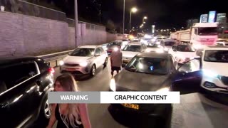 Car drives through Israeli protesters in Tel Aviv