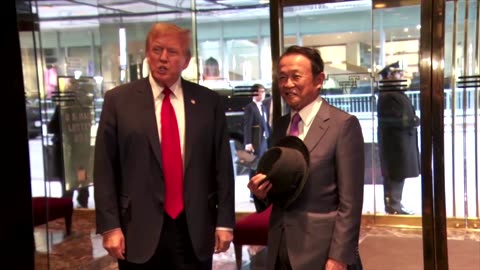 Trump hosts former Japan PM Aso in New York