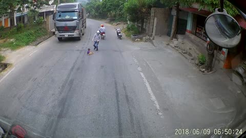 Baby Runs onto Road