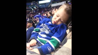 Tiny Hockey Fan Only Wakes Up To Cheer And Clap