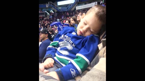 Tiny Hockey Fan Only Wakes Up To Cheer And Clap