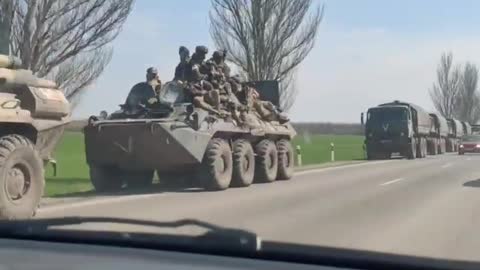 A column of Russian marines on the way to Donbass under the imperial flag