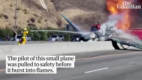 Mock WWII fighter plane crashes into Los Angeles-area freeway