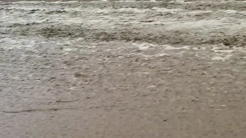 Flood Waters Spill Over onto California Highway